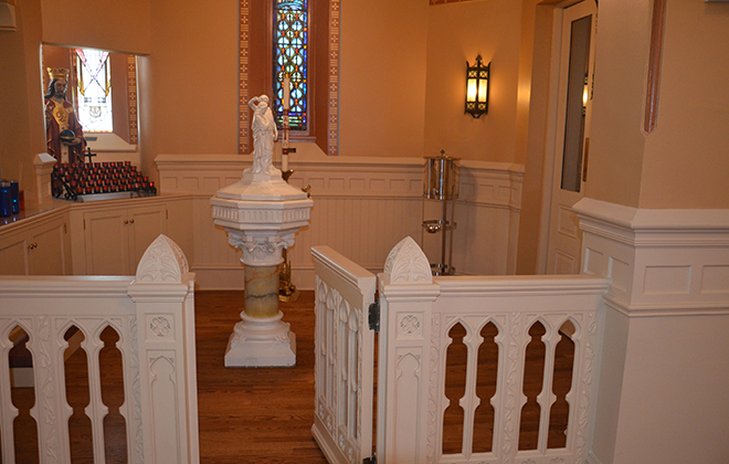 The baptismal font, located near the entrance to the church, is used for baptisms on the Easter Vigil as well as on other occasions.
