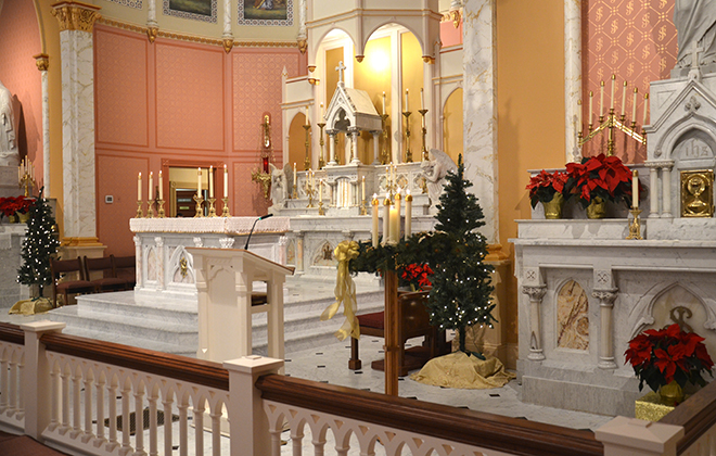 The sanctuary of St. Francis decorated for the Christmas season.