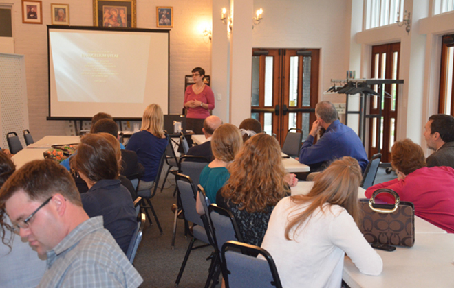 Parishioners gather to hear Karen Adams (of the Culture of Life Committee) speak on John Paul II's <em>Evangelium Vitae</em>.