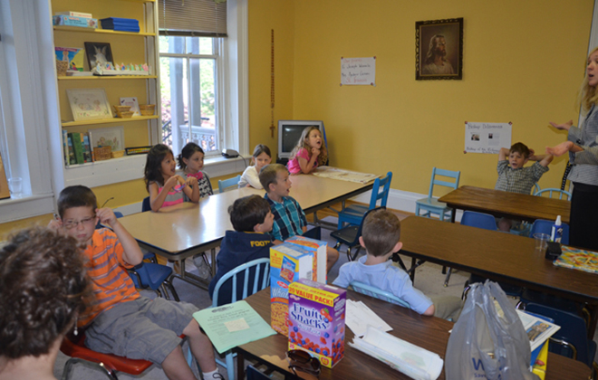 Dedicated volunteer teachers meet every week with the young people of St. Francis to teach the fundamentals of the faith.