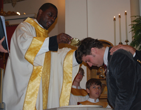 The RCIA program culminates with the baptism of the catechumens