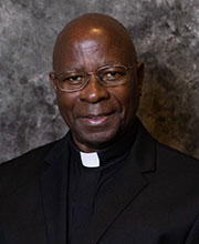 Father Matthias Lusembo, Pastor