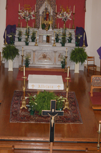 Members of the various altar and church care committees help to beautify the church for Sundays and major feastdays