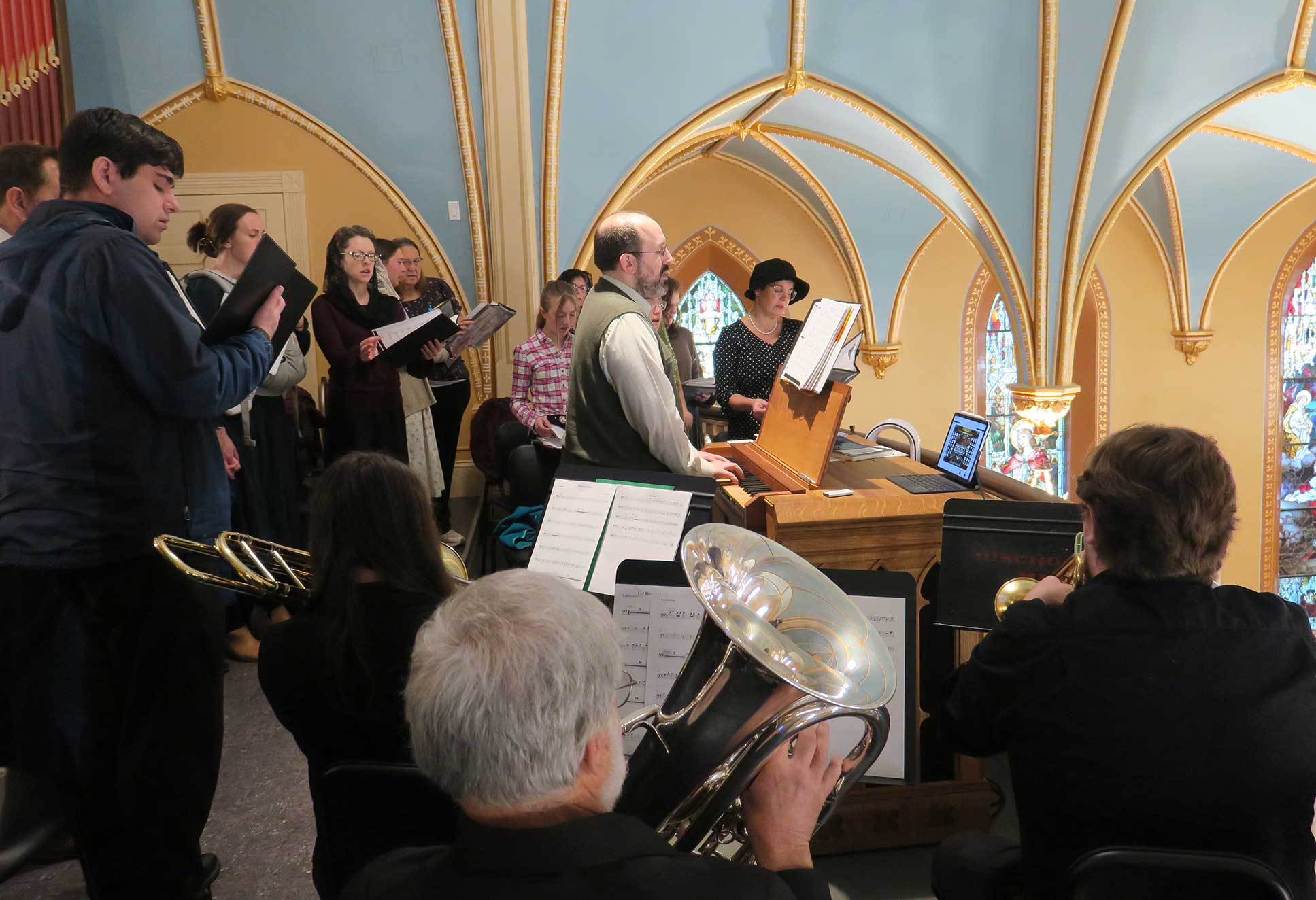 The St. Francis Choir sings at Sunday Mass