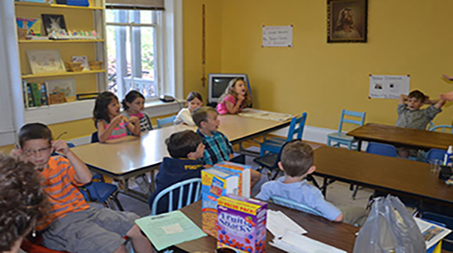 Dedicated volunteer teachers meet every week with the young people of St. Francis to teach the fundamentals of the faith.